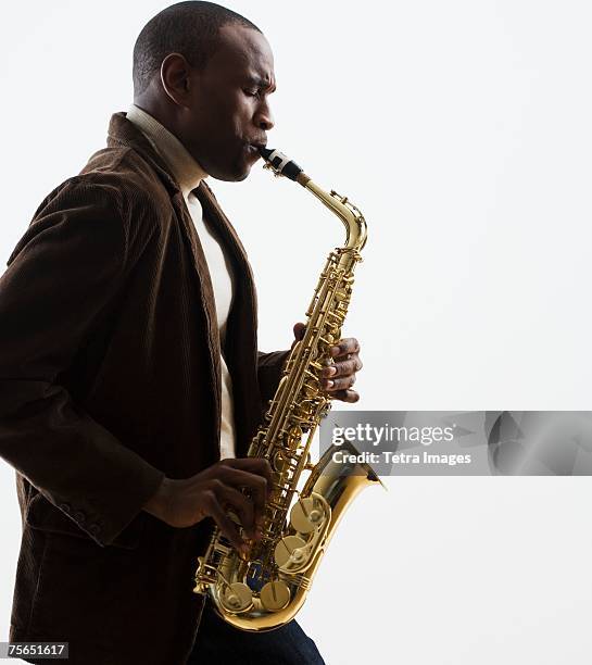 man playing saxophone - afroamerikansk kultur bildbanksfoton och bilder