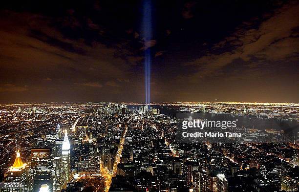 The "Tribute in Light" memorial to the World Trade Center is seen from the Empire State Building April 3, 2002 in New York City. The "Tribute in...