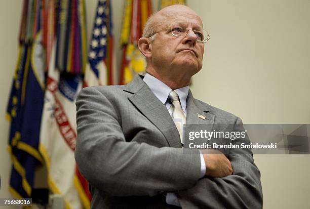Defense Undersecretary for Intelligence James Clapper waits for a joint meeting of the House Armed Services Committee and House Select Intelligence...