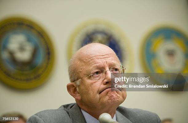 Defense Undersecretary for Intelligence James Clapper listens during a joint meeting of the House Armed Services Committee and House Select...