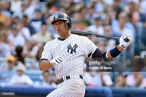 Alex Rodriguez of the New York Yankees swings at the pitch against the Tampa Bay Devil Rays on July 21, 2007 at Yankee Stadium in the Bronx borough...