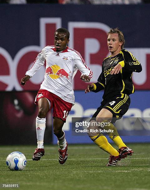 New York Red Bulls Dane Richards fights off Columbus Crew's Rusty Pierce during the first half in an MLS game at Giants Stadium in the Meadowlands on...
