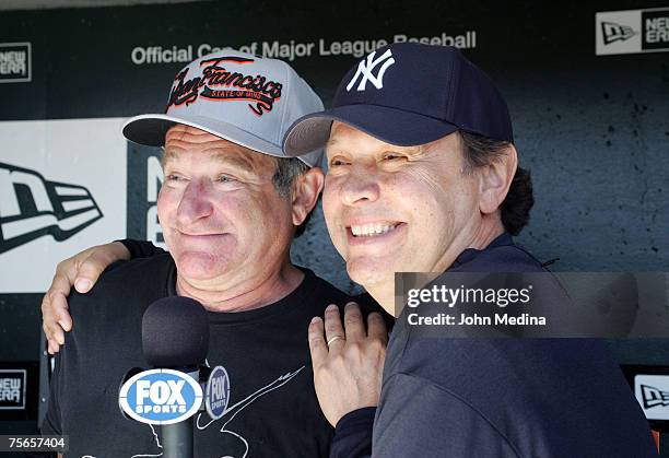 Actors Robin Williams and Billy Crystal enjoy themselves while taping a promotional TV spot for FOX Sports before the San Francisco Giants 13-inning...