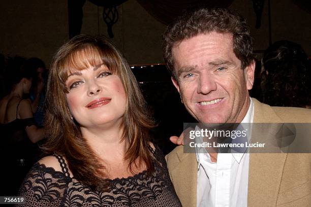 Actress Lisa Loring and actor Butch Patrick pose for a photo April 3, 2002 in New York City. Loring played Wednesday Addams in the television series...