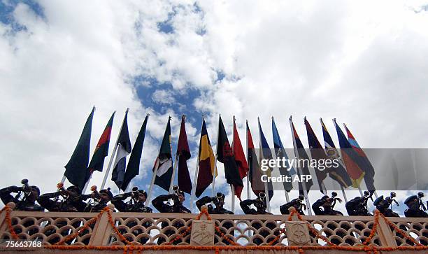 Indian Army officers soldiers blow the bugle during a wreath-laying ceremony at a war memorial during "Vijay Diwas" or 'Victory Day' celebrations in...