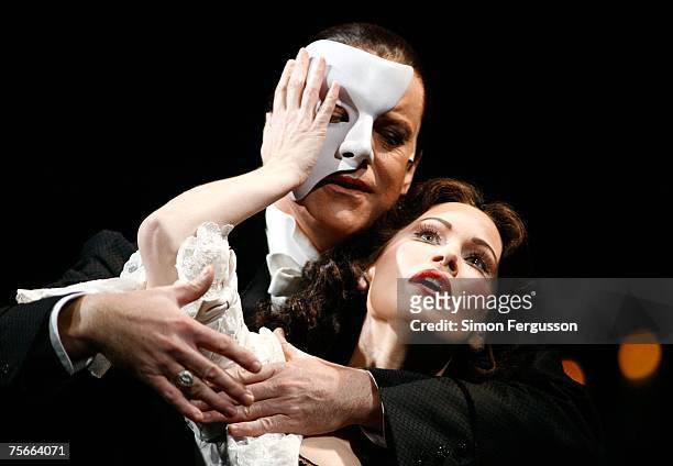 Anthony Warlow and Ana Marina, cast members of The Phantom of the Opera perform on stage at the photo call for the new production of Broadway's...