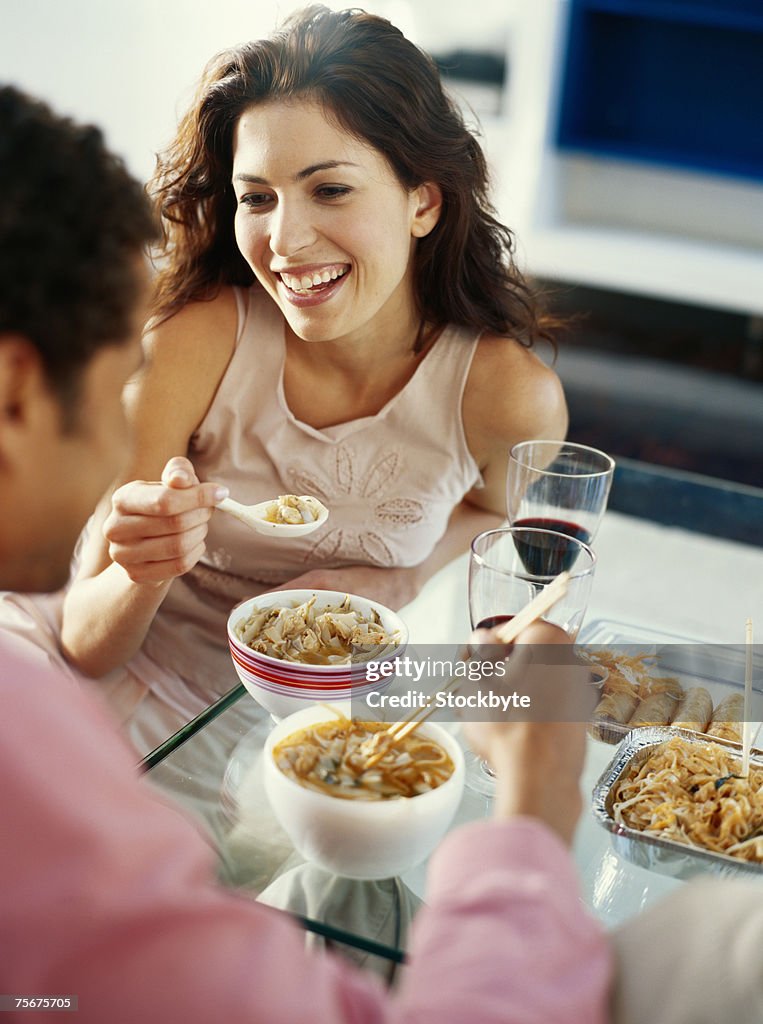 Young couple dining at restaurant