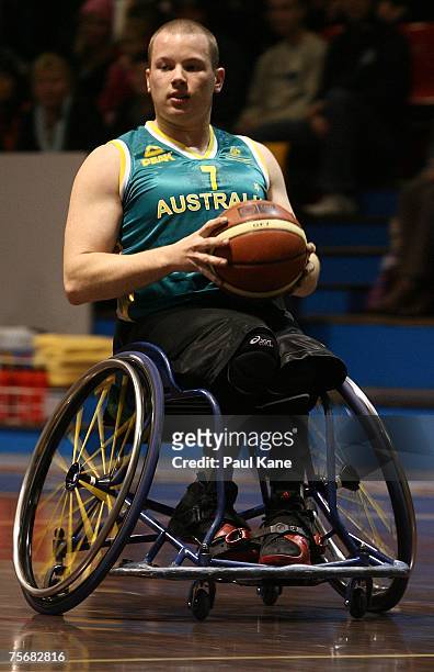 Shaun Norris of the Rollers looks for a pass during game two of the four-game international wheelchair basketball series between the Australian...
