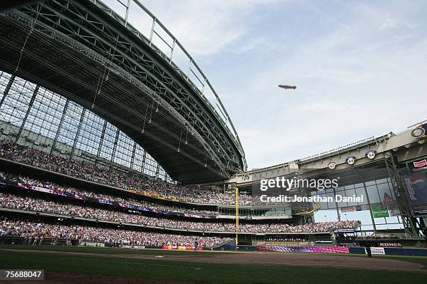 The Goodyear Blimp flies over the stadium during the San Francisco Giants game against the Milwaukee Brewers on July 22, 2007 at Miller Park in...