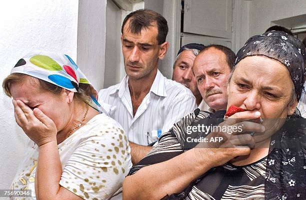 Tamara Magomadova and Malika Labazanova , relatives of victims of a massacre cry during a press conference in Grozny, Chechnya, 26 July 2007....