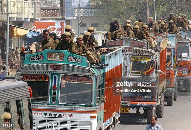 Officers from the Central Reserve Police Force arrive in the northern Indian city of Ayodhya, March 10, 2002 in anticipation of the hard-line Hindus...