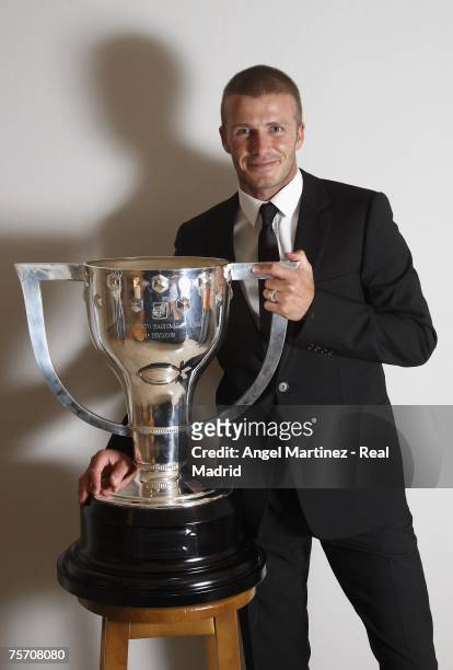 David Beckham of Real Madrid poses with the Liga trophy at the Santiago Bernabeu stadium on June 18, 2007 in Madrid, Spain.
