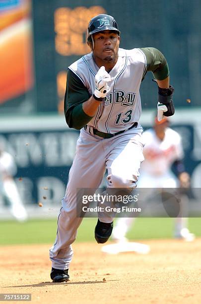 Carl Crawford of the Tampa Bay Devil Rays steals third base against the Baltimore Orioles at Camden Yards July 26, 2007 in Baltimore, Maryland.