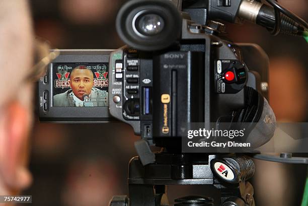 Milwaukee Bucks guard Maurice Williams is shown on a video display while addressing the media at a press conference announcing his free agent signing...