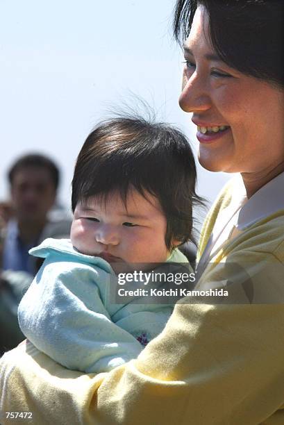 Japan's Crown Princess Masako enjoys a vacation with her daughter Princess Akiko April 6, 2002 in Kanagawa Prefecture, Japan. Princess Masako gave...