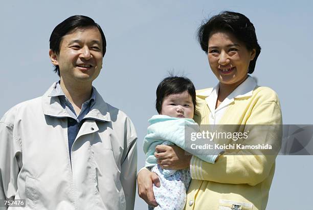 Japan's Crown Prince Naruhito and Crown Princess Masako enjoys a vacation with their daughter Princess Akiko April 6, 2002 in Kanagawa Prefecture,...