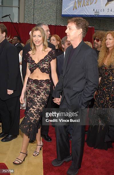 Musician Paul McCartney and fiancee model Heather Mills arrive for the 74th Annual Academy Awards March 24, 2002 at the Kodak Theater in Hollywood,...