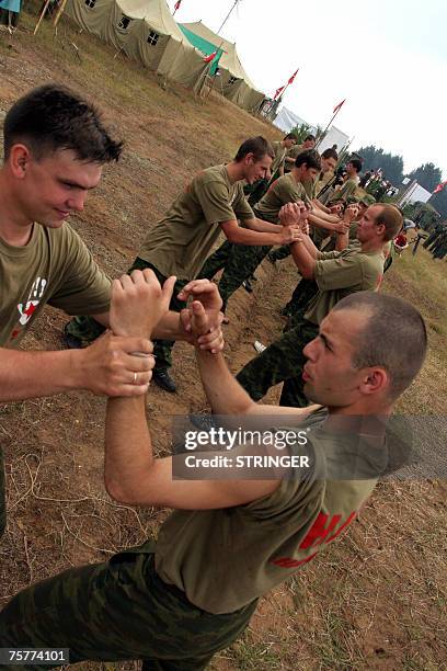 Picture taken 18 July 2007 shows members of the pro-Kremlin Nashi youth movement learning self-defense at their summer camp on Lake Seliger, 450...