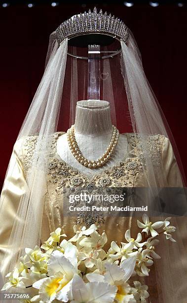 Princess Elizabeth's wedding dress, designed by Norman Hartnell, is displayed at the 'Royal Wedding: 20 Novermber 1957' exhibition at Buckingham...