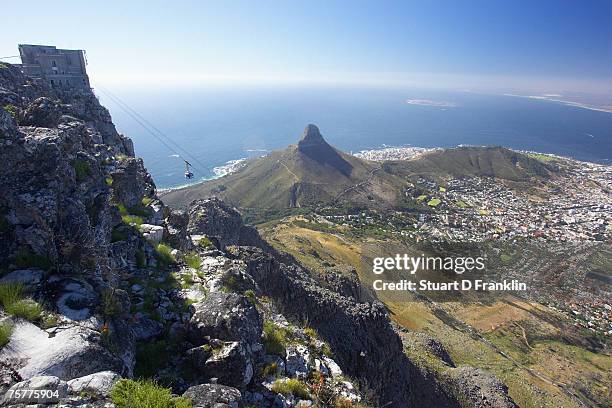 cable car to table mountain - city and signal hill below cape town, western cape province, south africa - cape town cable car stock pictures, royalty-free photos & images