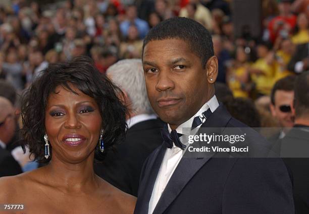 Actor Denzel Washington with his wife Paulette attendsthe 74th Annual Academy Awards at The Kodak Theater March 24, 2002 in Hollywood, CA.