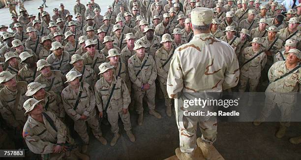 United States Army 101st Airborne Division Commander, Major General Richard Cody speaks to some of his troops after presenting medals April 8, 2002...