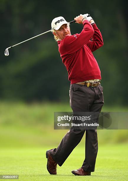 Miguel Angel Jimenez of Spain plays his approach shot on the 15th hole during the second round of The Deutsche Bank Players Championship of Europe at...