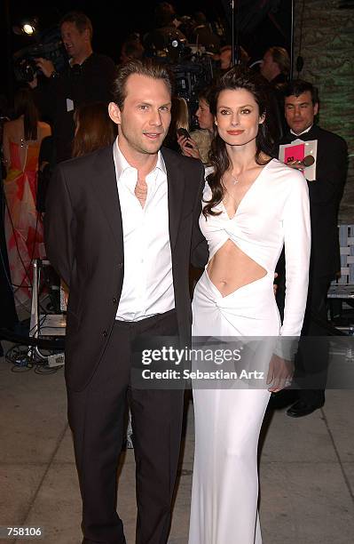 Actor Christian Slater and his wife Ryan Haddon attend the Vanity Fair Oscar Party at Mortons March 24, 2002 in West Hollywood, CA.