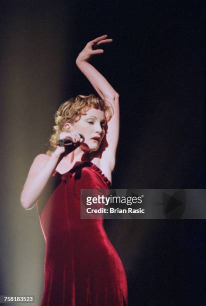 French singer Patricia Kaas performs live on stage in London in June 1994.
