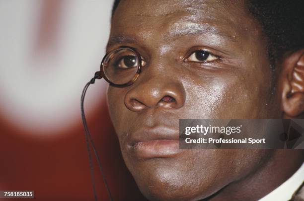 English super middleweight boxer Chris Eubank pictured wearing his customary monocle at a press conference in England in 1993.