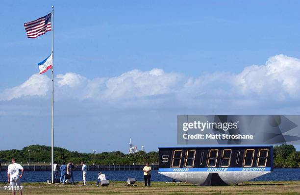 Space Shuttle Atlantis sits on launch pad 39-B waiting for software to be uploaded with 5 minutes before liftoff at the Kennedy Space Center April 8,...