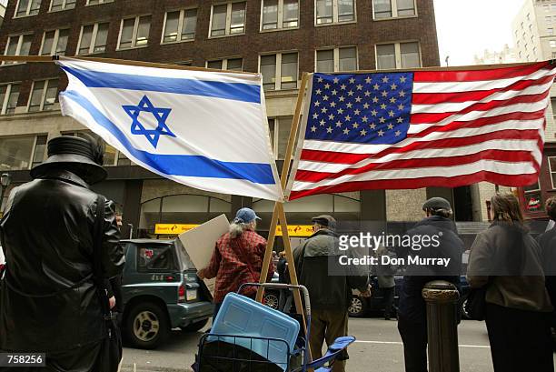 Jewish demonstrators gather to pray April 8, 2002 outside of the Israeli Consulate office in Philadelphia, PA. Over 50 synagogues were represented at...