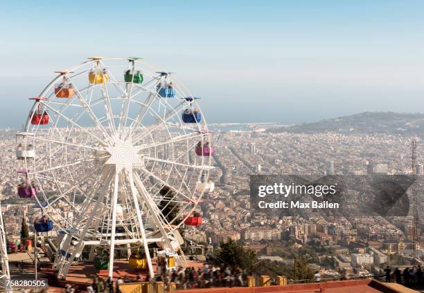 view from the tibidabo amusement park with the giradabo big wheel, barcelona, catalonia, spain - tibidabo fotografías e imágenes de stock