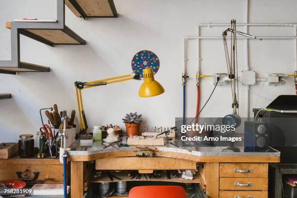 jewellery making equipment and tools on jewellery workshop workbench - jewellery workshop ストックフォトと画像