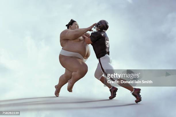 sumo wrestler and football player battling - sumo fotografías e imágenes de stock