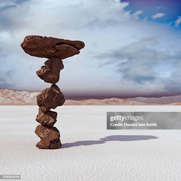 rocks balancing in desert - possible stock pictures, royalty-free photos & images