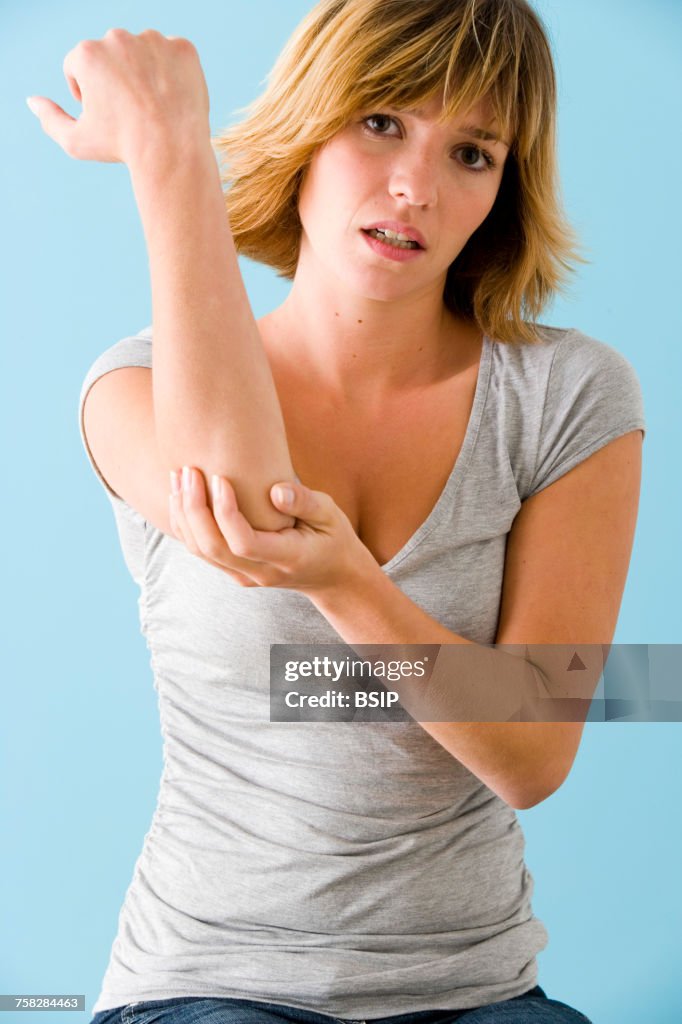 Elbow pain in a woman