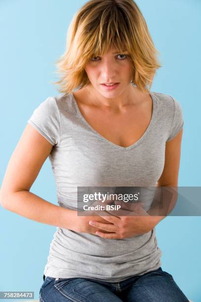 stomach pain in a woman - gastric ulcer stock-fotos und bilder