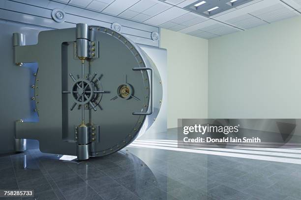 light from open vault door - safety deposit box stock pictures, royalty-free photos & images