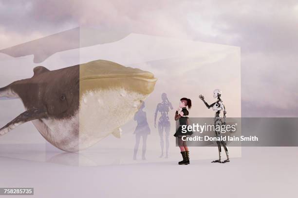 cyborg teaching girl about whale - showing appreciation stock pictures, royalty-free photos & images