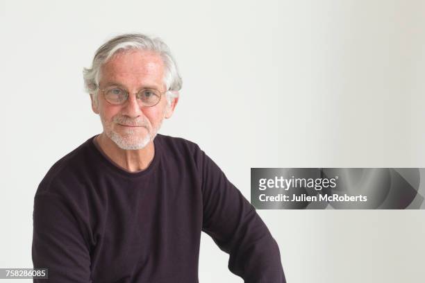 portrait of confident older caucasian man - man goatee stock pictures, royalty-free photos & images