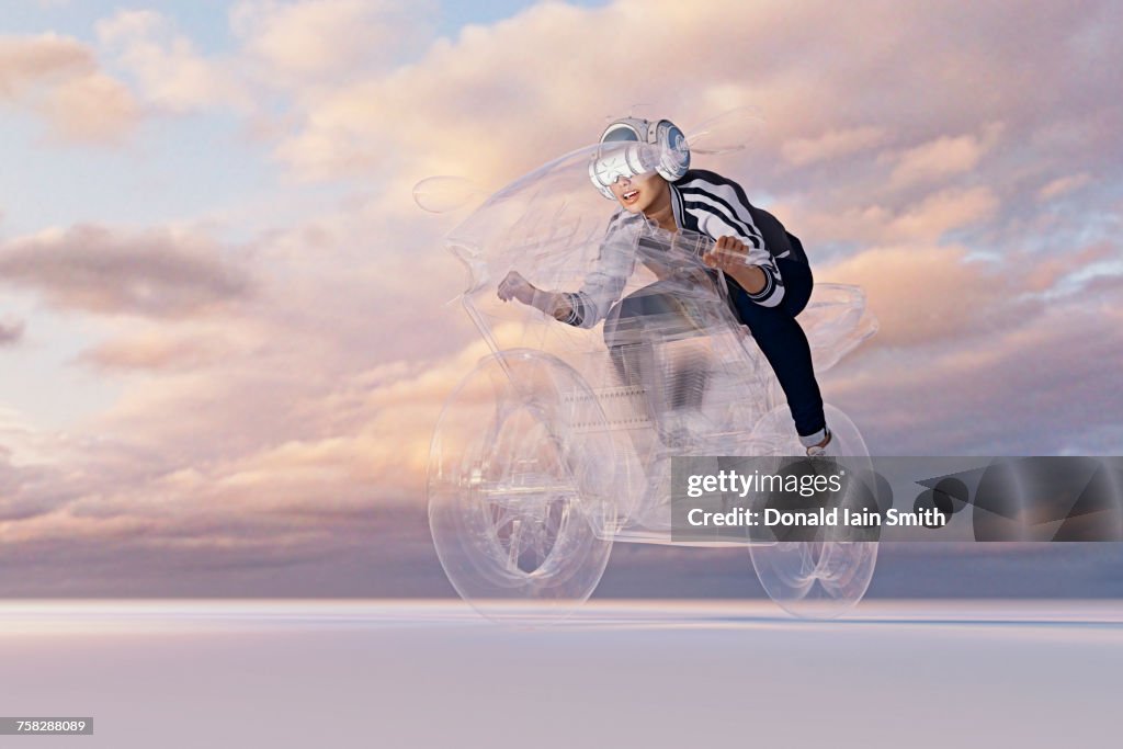 Woman wearing virtual reality helmet riding motorcycle