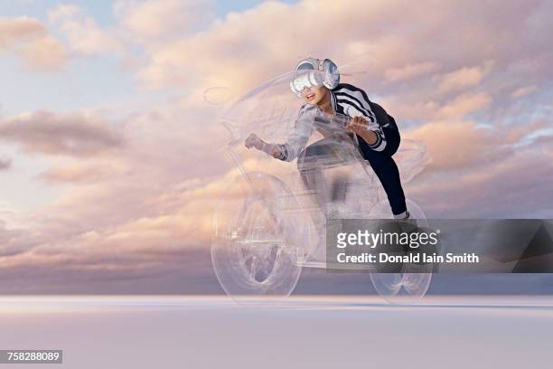 Woman wearing virtual reality helmet riding motorcycle