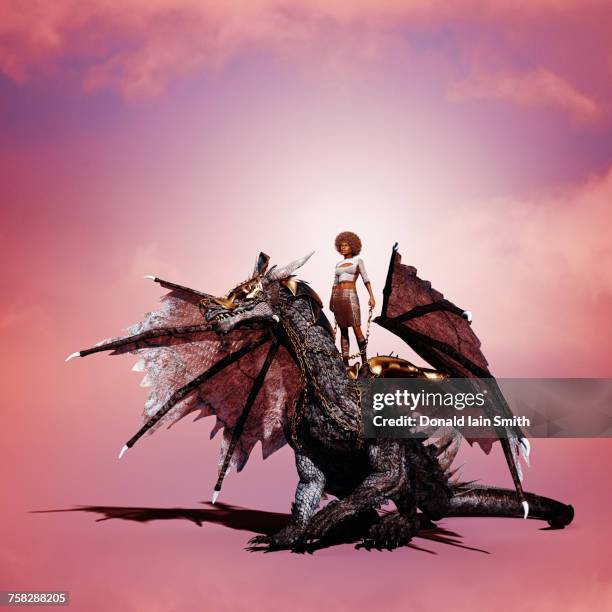 woman riding dragon - fantasy dragon stock pictures, royalty-free photos & images