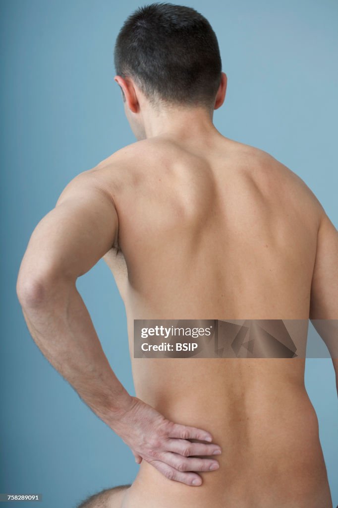 Lower back pain in a man