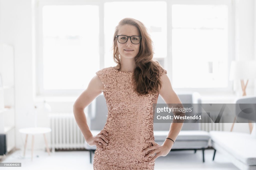Portrait of smiling woman wearing evening dress