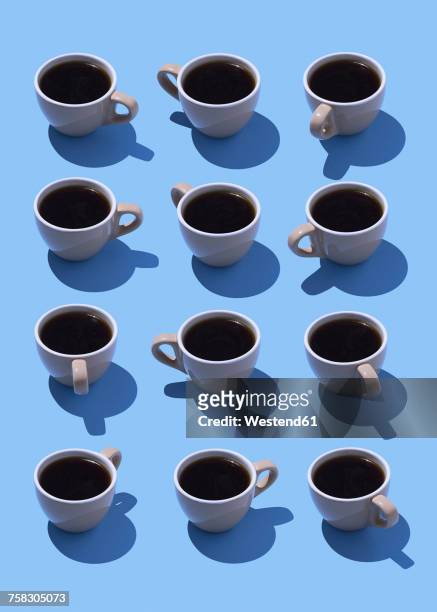 coffee cups on light blue ground, 3d rendering - black coffee stock illustrations