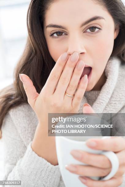 woman with mug, yawning - 21 & over stock pictures, royalty-free photos & images