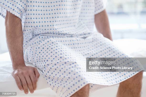 male patient wearing hospital gown - examination gown stock pictures, royalty-free photos & images