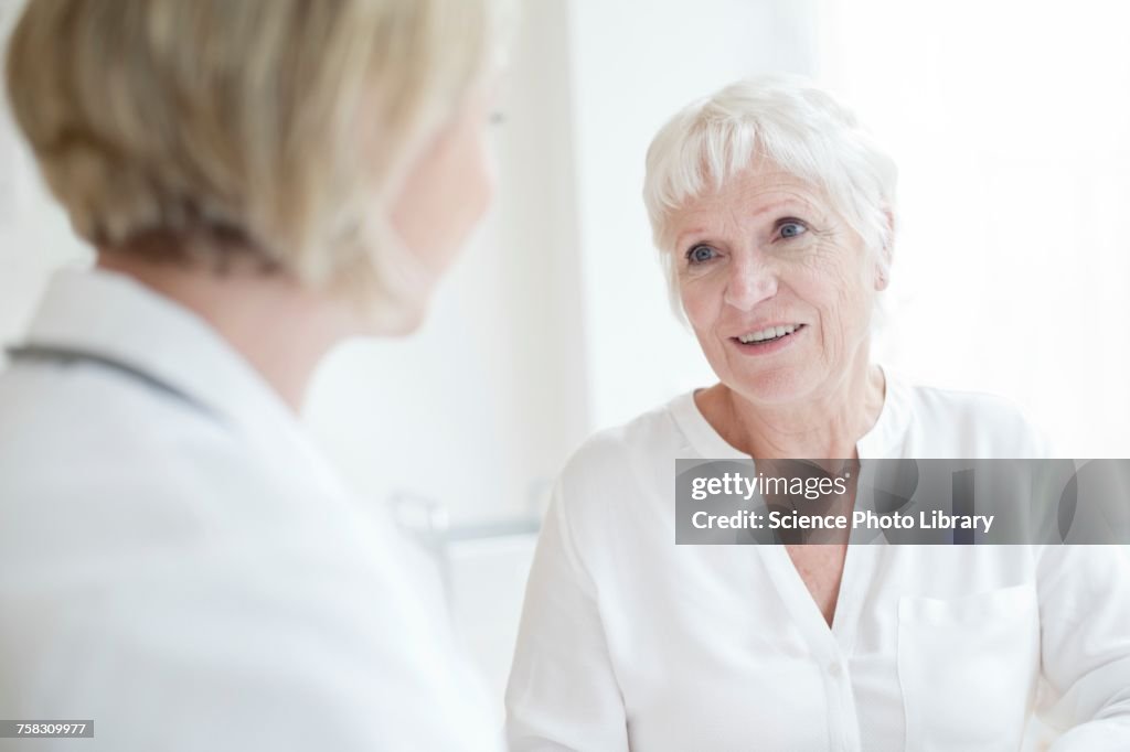 Senior woman listening to female doctor